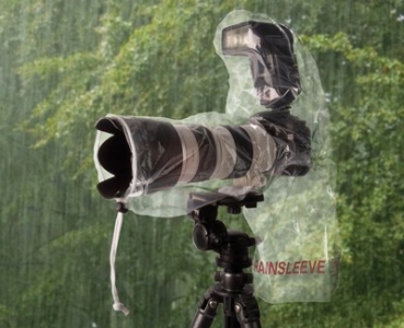 Clear polyethylene protects an SLR camera, lens and shoe-mounted flash from any unexpected weather conditions